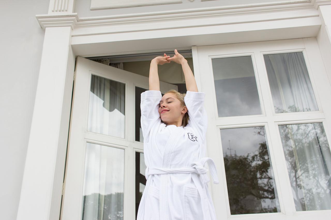 Central Hotel Panama Casco Viejo Ngoại thất bức ảnh A woman wearing a bathrobe